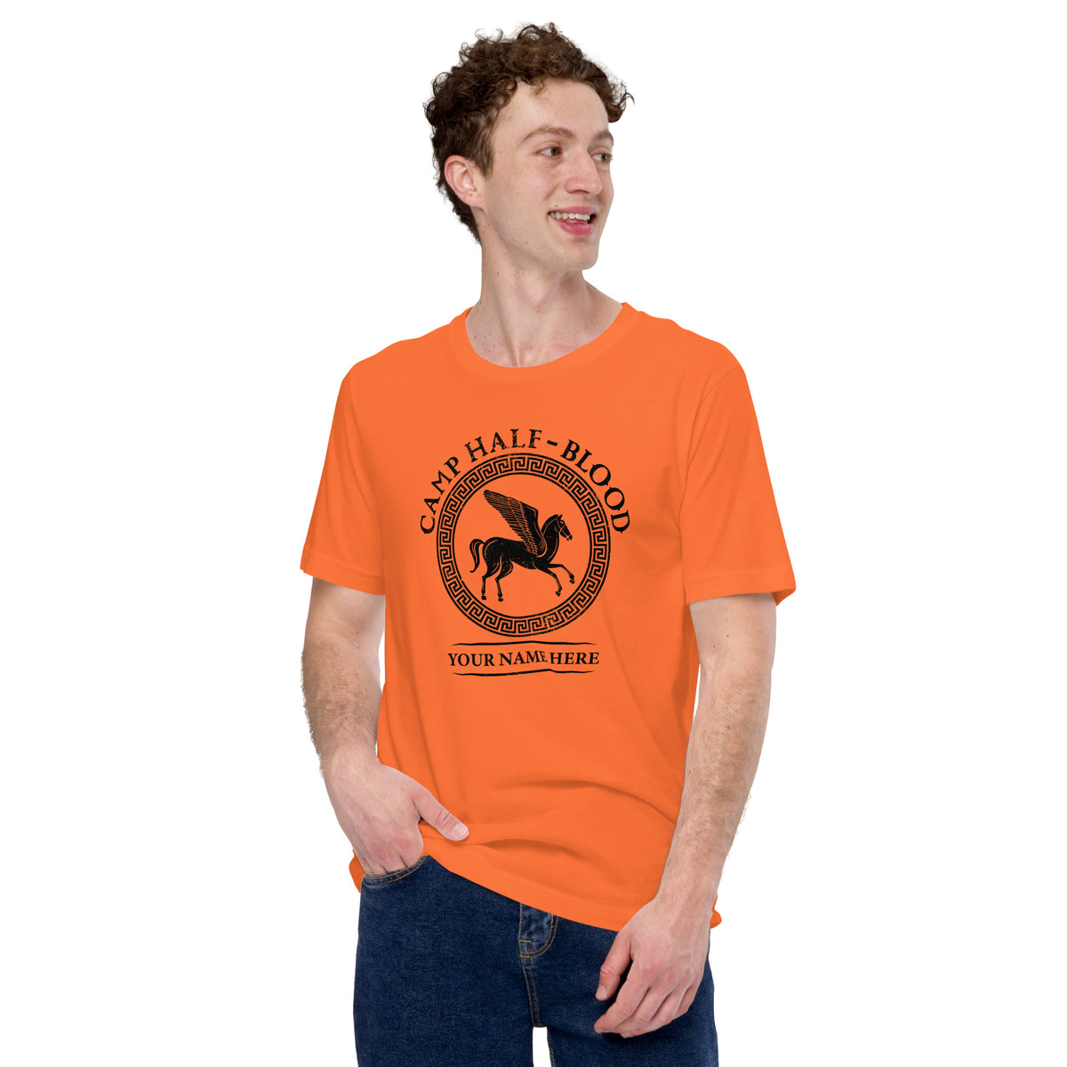 Folded orange Camp Half-Blood t-shirt showing the collar and shoulder taping